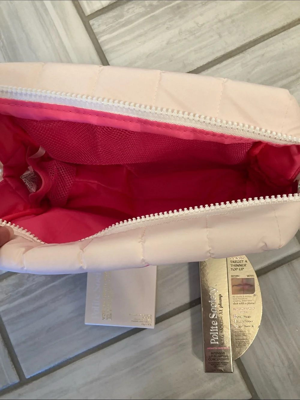 Polite Society lip plump, setting powder, and bag